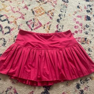 Pink goldhinge tennis skirt